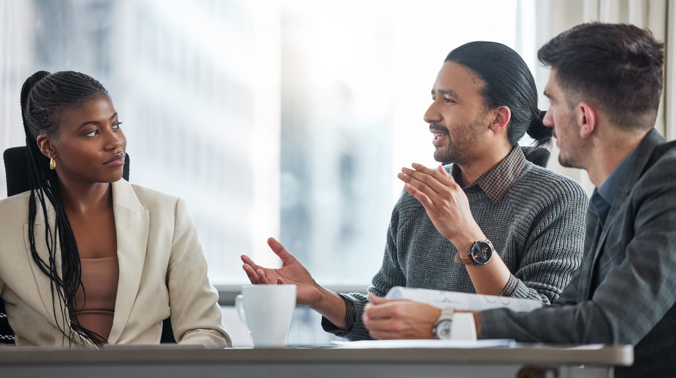 shot of a group of businesspeople having a meeting in a boardroom at work