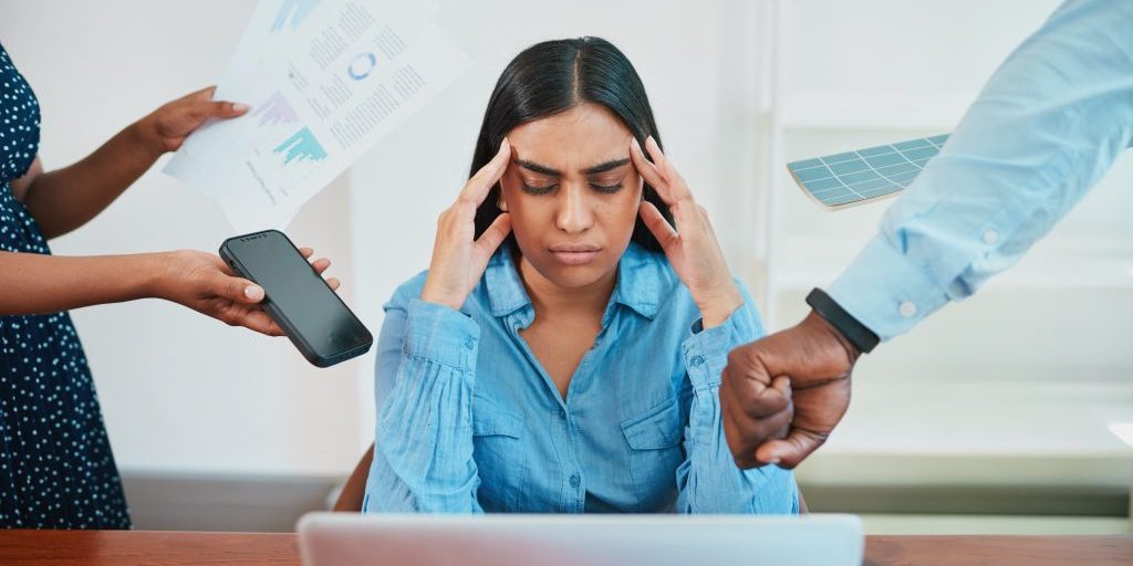 young business woman stressed, concept of demanding coworkers deadlines pressure